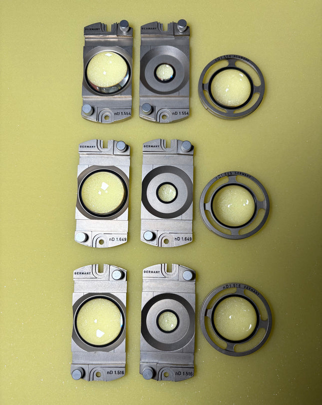 Parts of Leitz POL Microscope Fedorov Stage – n_D 1.516 / 1.554 / 1.649, showcasing vintage optical hardware and clear optics.