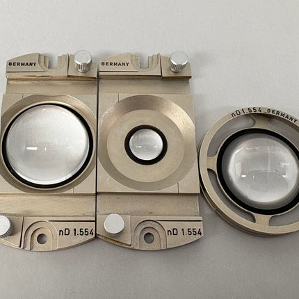 Parts of Leitz POL Microscope Fedorov Stage – n_D 1.516 / 1.554 / 1.649 showing three optical components and clear lenses.