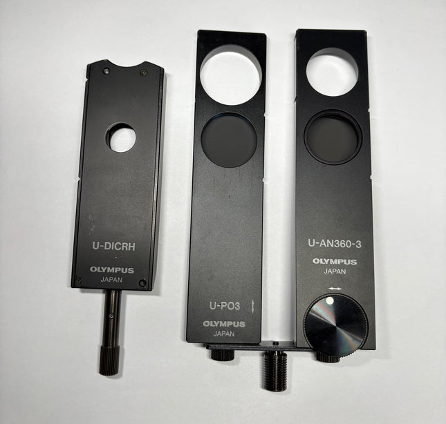 Olympus DIC Prism U-DICRH W/Analyzer Pol Slider U-AN360-3 W/ U-PO3 components displayed on a white background.