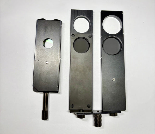 Olympus DIC Prism U-DICRH W/Analyzer Pol Slider U-AN360-3 W/ U-PO3 on a white background, in good optical condition.