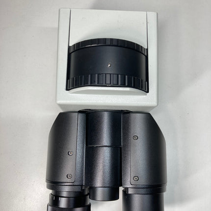 Olympus U-BI90CT Microscope Binocular Tube for Inverted IX GX Series shown from above on a white surface.