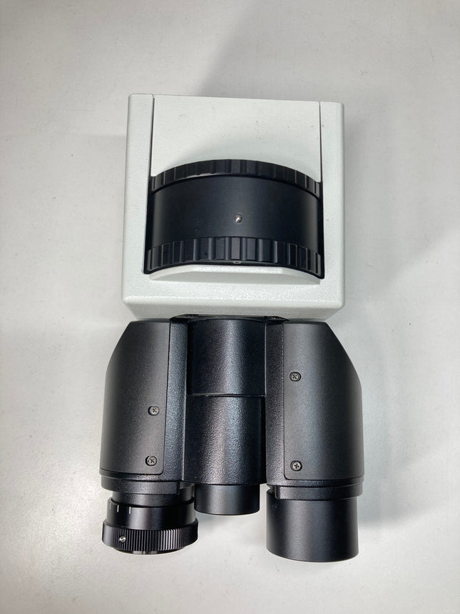 Olympus U-BI90CT Microscope Binocular Tube for Inverted IX GX Series shown from above on a white surface.