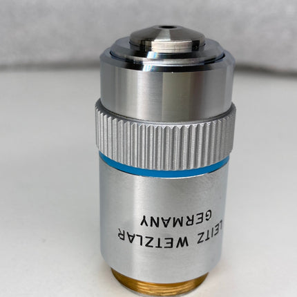 Leitz Wetzlar Microscope PL APO 40x0.75 160/0.17 Objective RMS viewed from the side with silver and blue detailing.