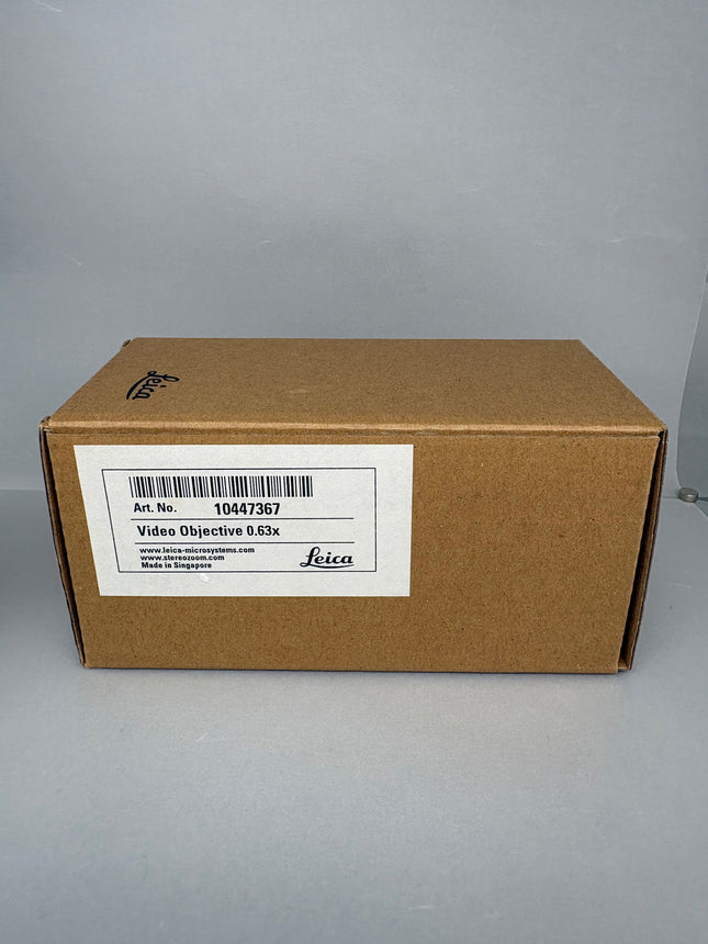 Leica Microscope C-mount Camera Adapter 0.63x 10447367 packaging with label and product information.