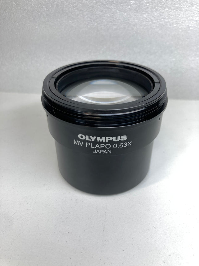 Olympus Stereo Microscope Objective MV PLAPO 0.63x NA0.15 WD 87mm f/ MVX10 in like new condition.