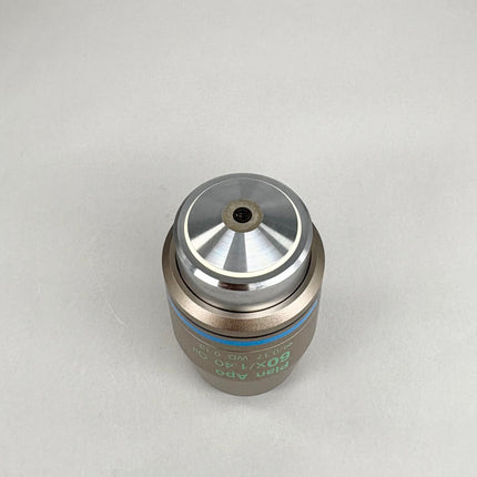 Nikon Plan Apo 60x1.40 Oil ∞/0.17 Ph3 DM WD 0.13 M25 Objecive lens viewed from above.
