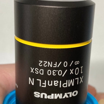 Olympus XLMPlanFL N 10x0.30 ∞/0 DSX Infinity Microscope Objective showcasing its design and specifications.