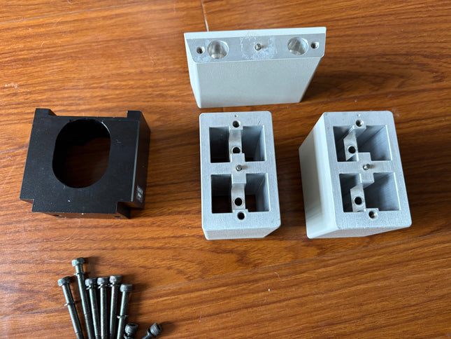 Nikon T-BSUK 70 Up Kit 70mm f/ TE2000 microscopes parts and accessories on a wooden surface.