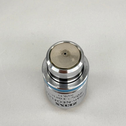 Zeiss EC Plan NEOFLUAR 40x1.30 Oil 420462-9900 M27 objective microscope lens from above view.