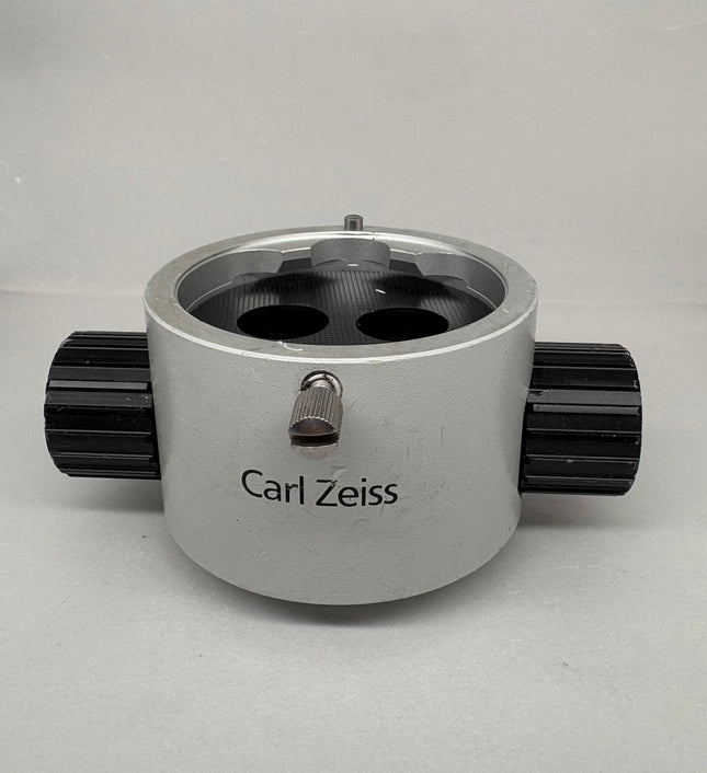 Zeiss Opmi Microscope Magnifacation Changer 1/0.6/1.6 Zoom Body shown from the top with black knobs.