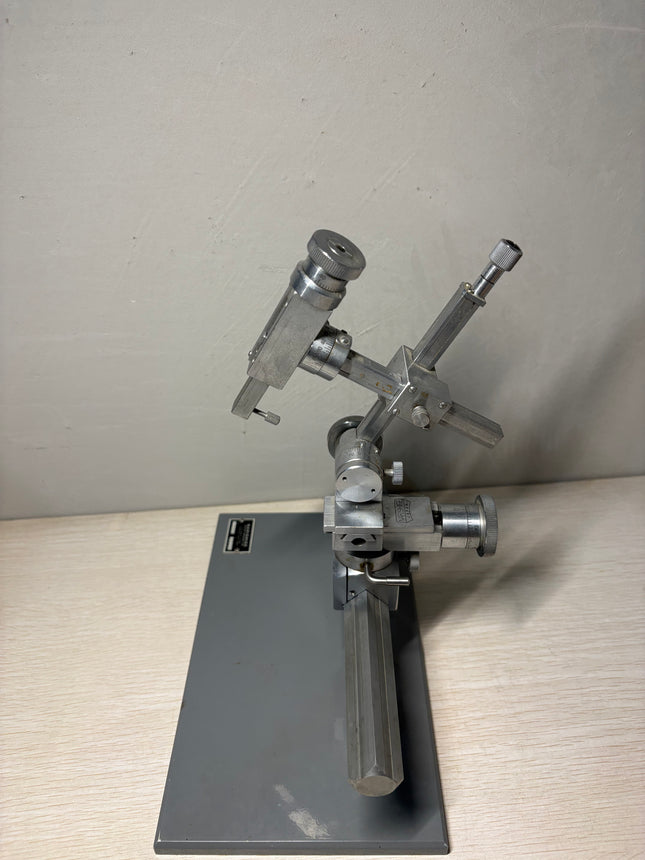 Narishige SM-11 3-Axis Mechanical Micromanipulator Stereotaxic MA-2 Base System on a gray base, used in fully working condition.