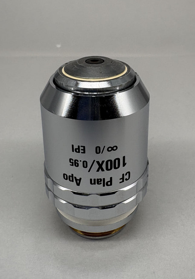 Nikon CF Plan Apo 100x0.95 ∞/0 EPI WD 0.32 RMS Thread Microscope Objective lens with silver and black design
