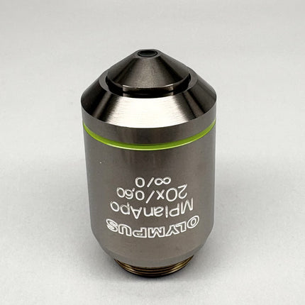 Olympus MPlanApo 20x0.60 ∞/0 RMS Objective microscope lens with silver body and green ring, showing labels clearly.