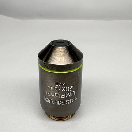 Olympus Microscope UMPlanFl 20x0.46 ∞/0 RMS Objective showing a microscope lens with numerical aperture.