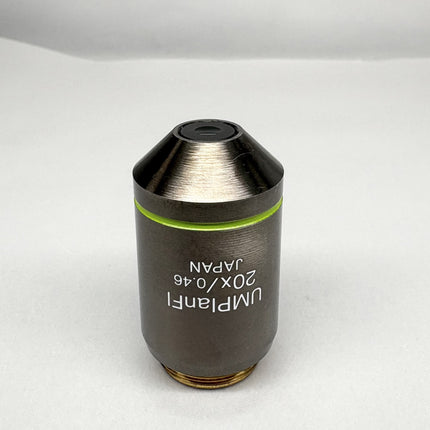Olympus Microscope UMPlanFl 20x0.46 ∞/0 RMS Objective in a close-up view showing its design and specifications.