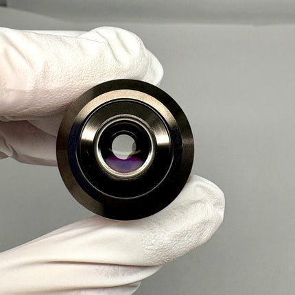 Olympus LUCPlanFL N 20x0.45 Ph1 ∞/0-2/FN22 UIS2 Objective held in gloved hand