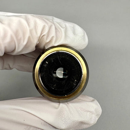 Olympus LUCPlanFL N 40x/0.60 RC3 ∞/0-2/FN22 UIS2 Microscope Objective lens held in gloved hand