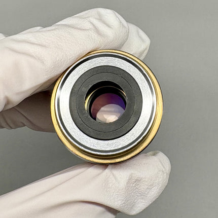 Zeiss EC Plan-NEOFLUAR 10x/0.3 Microscope Objective 420340-9900 M27 held in gloved hand
