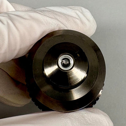 Olympus Microscope Objective UApo /340 40x1.15 W ∞/0.13-0.25 RMS in gloved hand showing details.