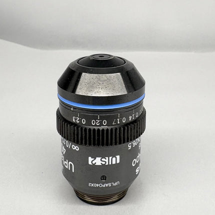 Olympus UPlanSApo 40x0.95 ∞/0.11-0.23/FN26.5 Microscope UIS2 Objective displayed from a side angle.