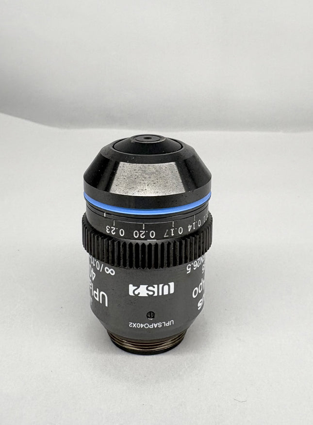 Olympus UPlanSApo 40x0.95 ∞/0.11-0.23/FN26.5 Microscope UIS2 Objective displayed from a side angle.