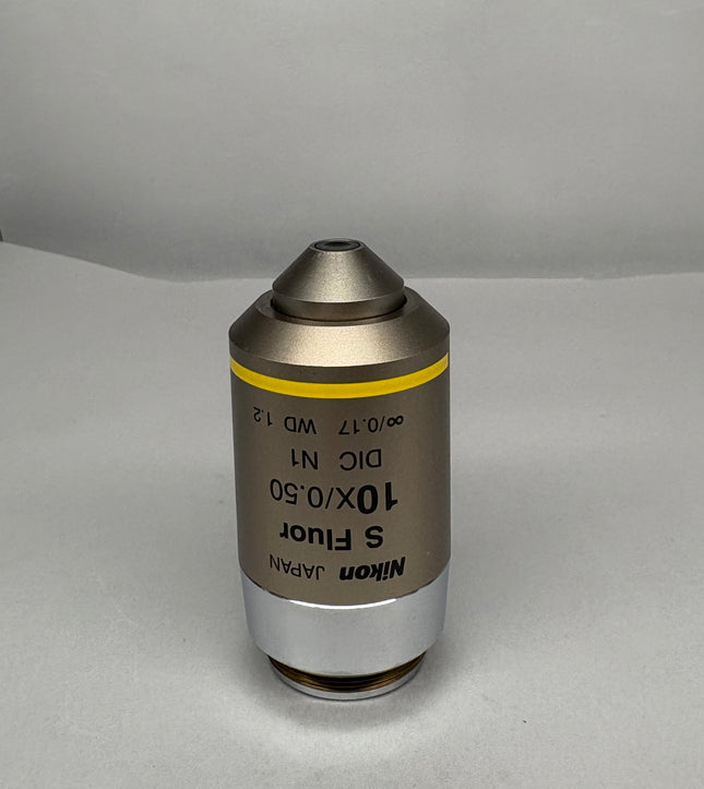 Nikon S Fluor 10x0.50 DIC N1 ∞/0.17 WD 1.2 Microscope Objective shown from an angled perspective.