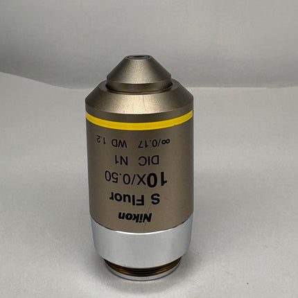 Nikon S Fluor 10x0.50 DIC N1 ∞/0.17 WD 1.2 Microscope Objective on a gray background