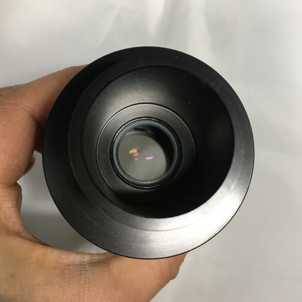 Leica 2.5x DSLR Camera Adapter Tube 10446175 held in hand, demonstrating its optical design and condition.