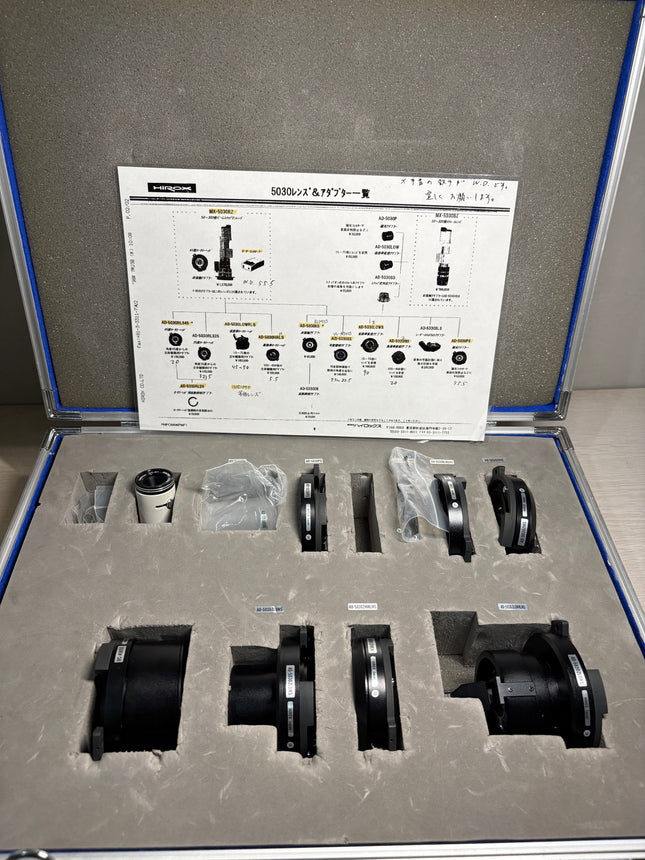 Original HIROX MX-5030 Adapter Accessory Set (AD-5030RLS45, AD-5030ZLOWS, VC-A50SS) displayed in a case with instruction sheet.