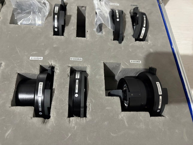 Original HIROX MX-5030 Adapter Accessory Set (AD-5030RLS45, AD-5030ZLOWS, VC-A50SS) displayed in a foam case.