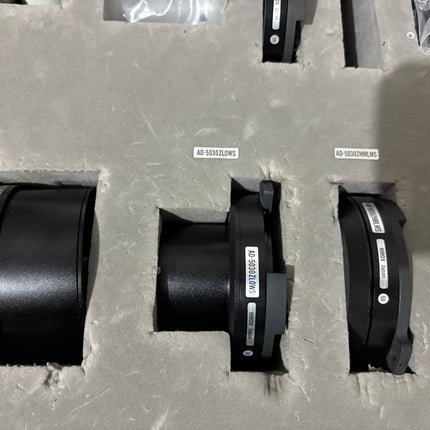 Original HIROX MX-5030 Adapter Accessory Set (AD-5030RLS45, AD-5030ZLOWS, VC-A50SS) showing adapter components in storage.