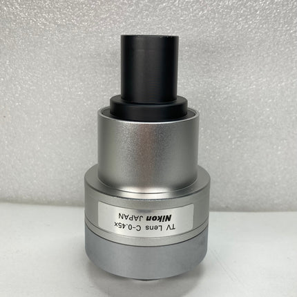 Nikon TV Lens C-0.45X MQD42040 C-Mount Camera/Photo Adapter showing logo details 