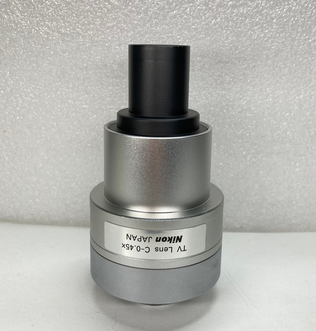 Nikon TV Lens C-0.45X MQD42040 C-Mount Camera/Photo Adapter showing logo details 