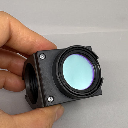 Olympus U-MNUA2 Fluorescence Filter Cube for BX2 IX2 Microscopes held in hand