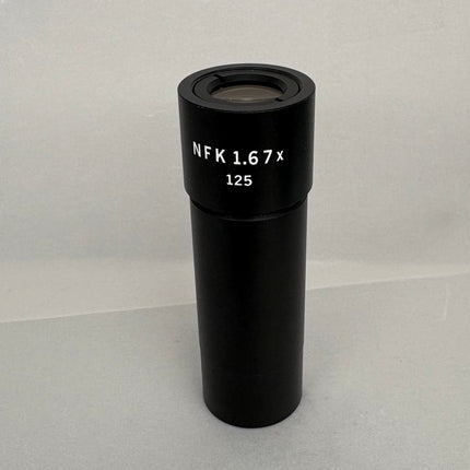 Olympus NFK 1.67x Microscope eyepiece Photo Relay lens in black with clear optical glass lens.