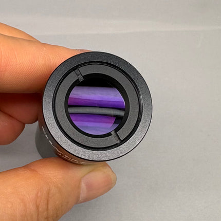 Close-up of Olympus NFK 1.67x Microscope eyepiece Photo Relay lens showing clean glass and optical quality.