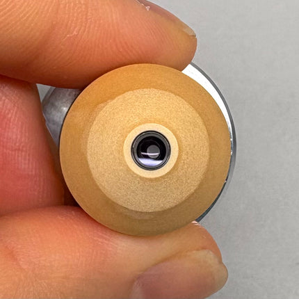 Zeiss W ACHROPLAN 40x0.75 440090 Microscope Water Objective with a clear lens and RMS thread, held in hand.