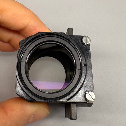 Zeiss Microscope Fluorescence Filter Cube Filter set 02 for AXIO held in hand to showcase optical features