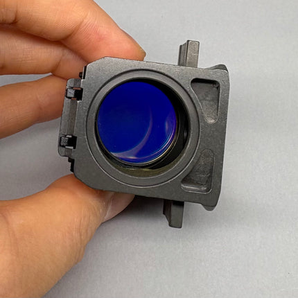 Zeiss Microscope Fluorescence Filter Cube Filter set 49 for AXIO held in hand to showcase optical features.shown from the side, displaying colorful filters.
