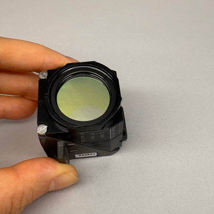 Zeiss Microscope Fluorescence Filter Cube Filter set 49 for AXIO held in hand to showcase optical features