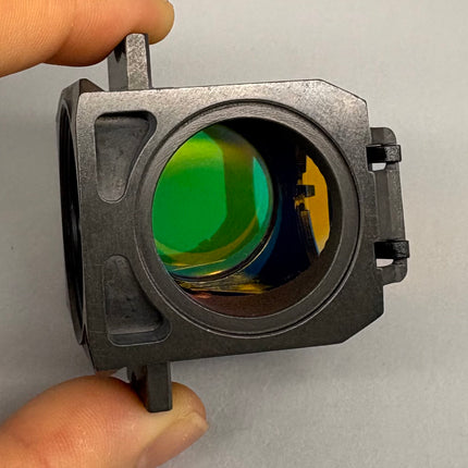 Zeiss Microscope Fluorescence Filter Cube Filter set 10 for AXIO shown from the side, displaying colorful filters.