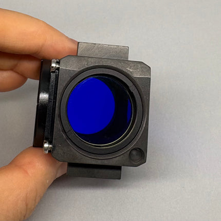 Zeiss Microscope Fluorescence Filter Cube Filter set 10 for AXIO held in hand to showcase optical features.