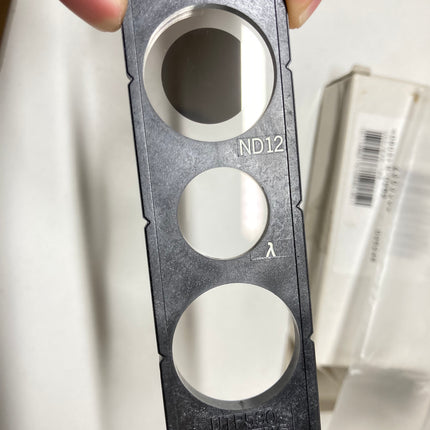 Olympus Microscope Slider BH2-UTP530 ND12 Full Lambda for BH2-UMA showing ND12 filter in hand.