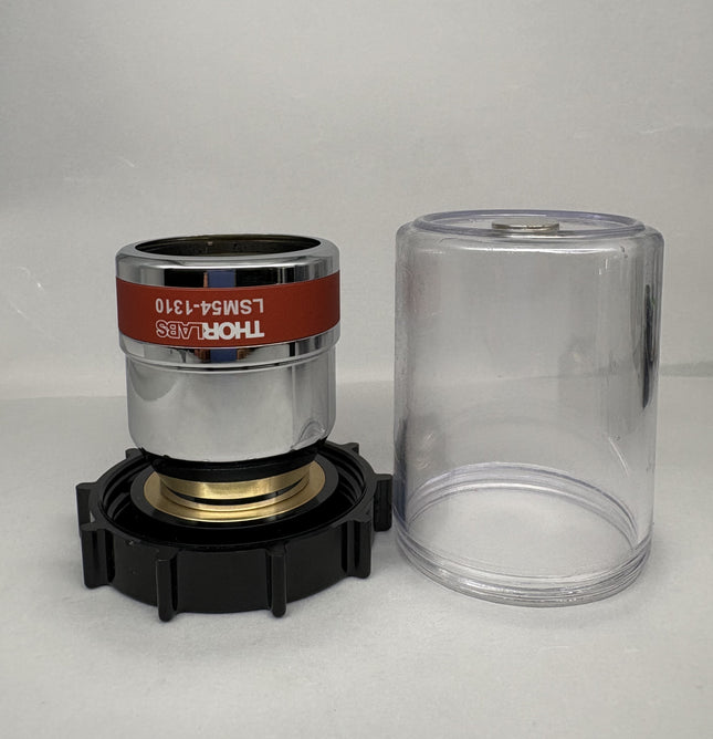 Thorlabs LSM54-1310 Large FOV OCT Scanning Objective Lens (1200–1400 nm, 54 mm EFL, 64 mm WD, M25x0.75) with protective case