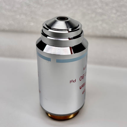 Nikon LU Plan 50X 0.80 Pol ∞/0 WD1.0 M25 Eclipse Microscope Objective shown from the side.