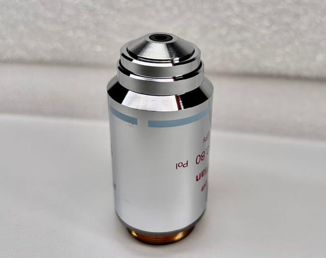 Nikon LU Plan 50X 0.80 Pol ∞/0 WD1.0 M25 Eclipse Microscope Objective shown from the side.