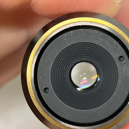 Nikon LU Plan 50X 0.80 Pol ∞/0 WD1.0 M25 Eclipse Microscope Objective lens close-up, showcasing intricate optical design.