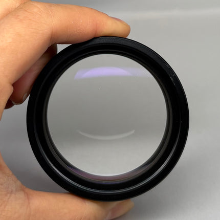 Olympus DF PLAN 0.5x objective for SZH SZX Series Stereo Microscopes shown in close-up view, highlighting optical condition.