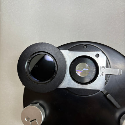 Olympus 1.4 Nomarski DIC NIC & phase contrast universal condense w/1.25x intermediate attachment  held in hand to showcase optical features