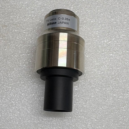 Nikon TV Lens C-0.35x C-Mount Camera/Photo Adapter image showing top view on a neutral background.